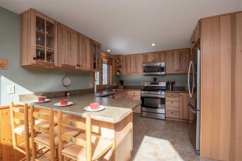 Fully stocked kitchen has everything you need for preparing meals.