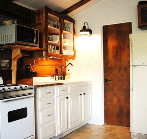 Kitchen on main level of cabin.