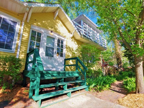Front entry.  Walkway around to back deck.  View of 2nd floor screened porch.