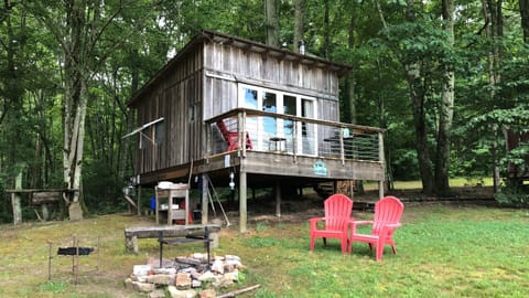 Hammock, campfire, this glamping space has it all.