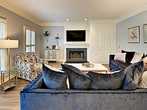 Livingroom Smatt Roku TV and local cable. Fireplace aesthetic only