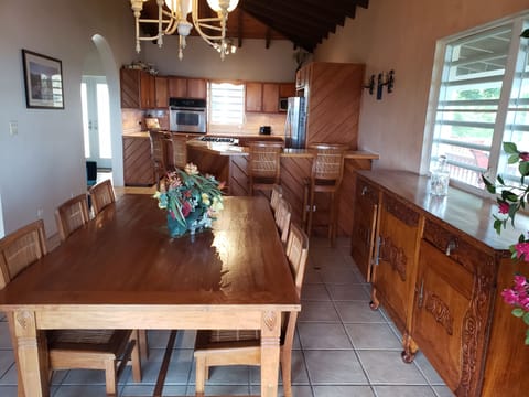 Dining room; 6 person seating, bar 4 person seating & kitchen