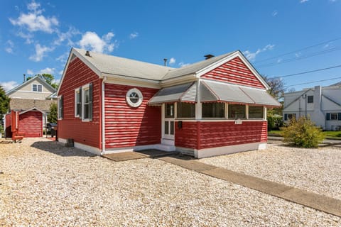 View of enclosed front porch from the street.