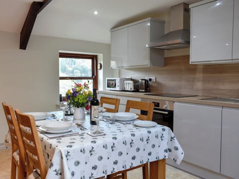 Well equipped gloss kitchen and dining area | 2 Swallowholm Cottages, Arkengarthdale, near Reeth