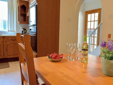 Farmhouse style kitchen with breakfast area | Yorke Villa, Fishguard