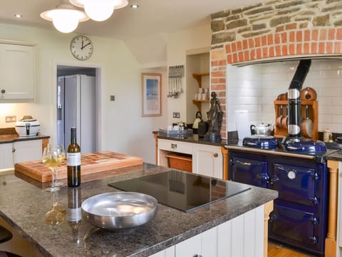 Kitchen area with granite-topped island | Cranford House - Cranford and The Coach House Cottages, Cranford, near Clovelly