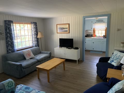 Living room with view to kitchen
