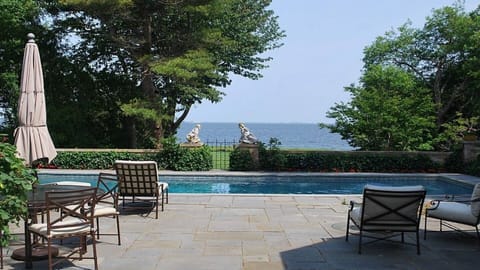 VIEW OF THE POOL AND THE BAY FROM THE TERRACE