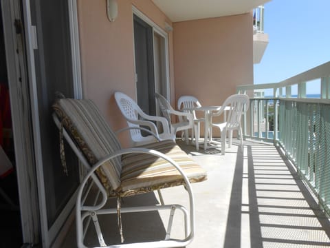 balcony has 2person slider, 4 person table/chairs and bar height bistro for 2.