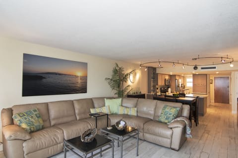 living room plenty of seating and the view of the Gulf