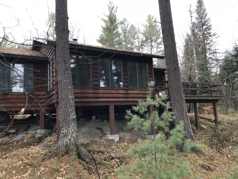 You-N-Me Inn the Trees, features a wall of windows . . .