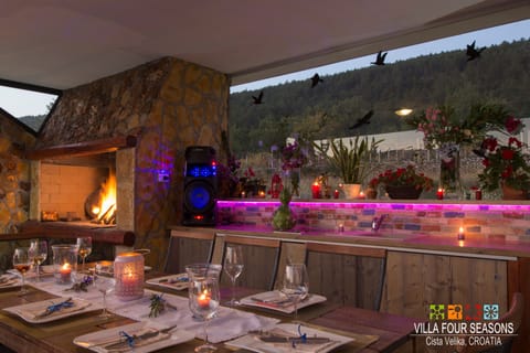 Covered terrace at night.