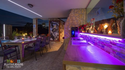 Covered terrace at night.