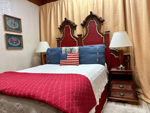 Comfortable Queen Size Bed with Cotton Linens.  Located on 1st floor.