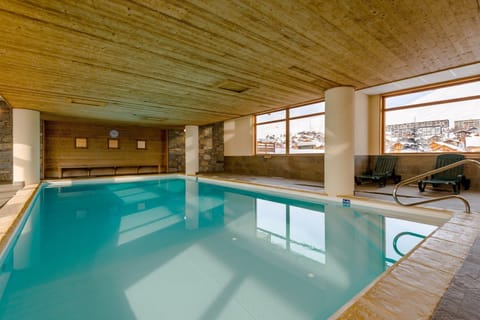 Dive into the lovely indoor pool after a great day!