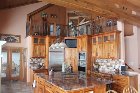 Kitchen looking up to the loft.