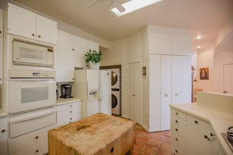 Kitchen features oven, warmer and 2 microwaves. Double stack washer/dryer.