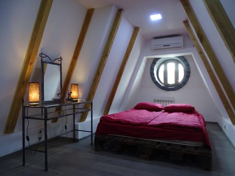 bedroom with porthole