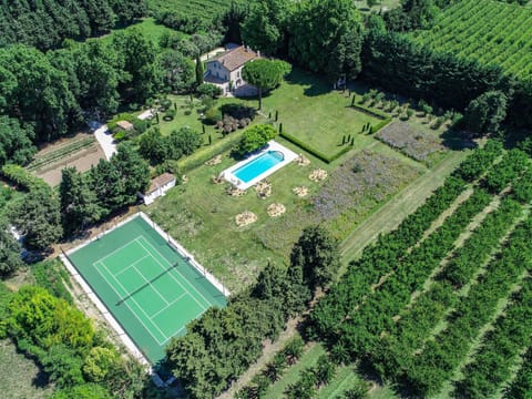 View to he house, the garden, the pool, the tennis court and part of the orchard