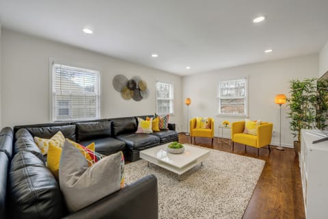 Living Room w/Two Single Size Sofa Beds and 55 Inch Samsung TV