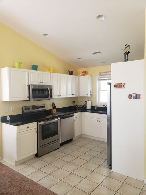 Updated appliances in fully equipped kitchen. 