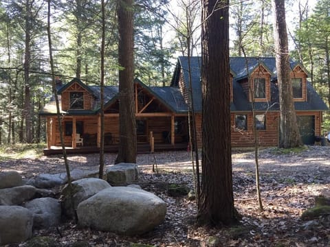 Beautiful cabin nestled in natural setting.