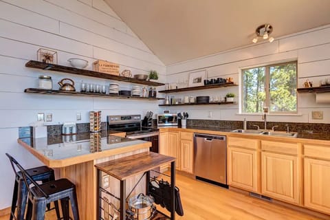 The Lodge boasts a fully appointed, modern, open kitchen with brand new stainless appliances. This space will make any chef happy as you cook with a view!
