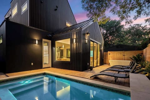 Luxe back deck with inground pool