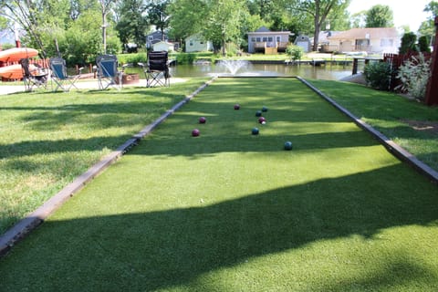 Bocce ball / bags / putting green / and in winter will be a crying court.