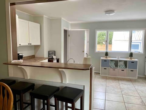 Four additional bar seats. There is seating for 12 guests outside as well!