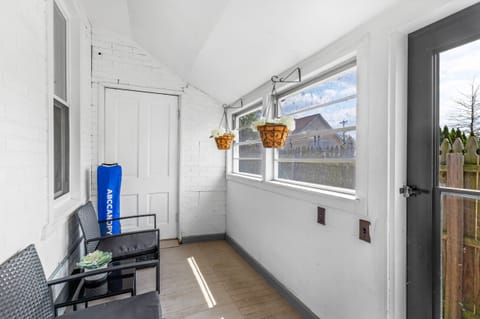 screened in porch right off of kitchen