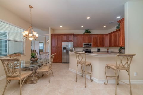 The open floor plan and gourmet kitchen can accommodate the entire family for happy hour followed by a spectacular dinner.