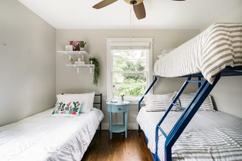 Bedroom 3 with a single twin bed and a bunk bed with full size bed on bottom and