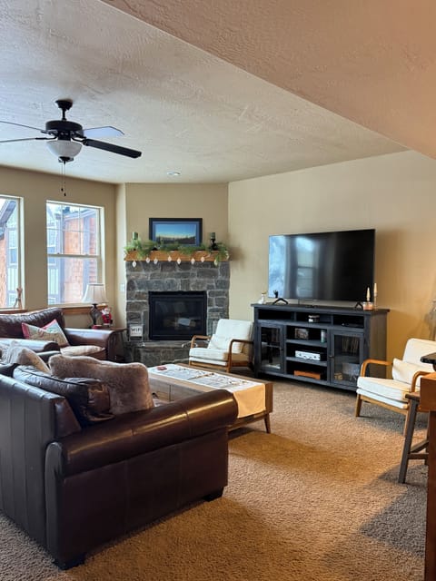 Cozy living with lots of seating. Large tv