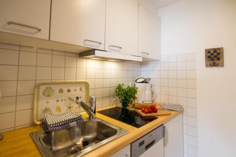 Kitchen in the holiday apartment Jungnamen Sand 14 in Wittduen on the island Amrum
