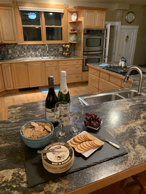 Welcome! Relish the Complimentary Wine, Sparkling Cider, Cheese and Crackers.