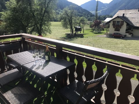 Drinks on the balcony in the sunshine overlooking the fields on the valley floor