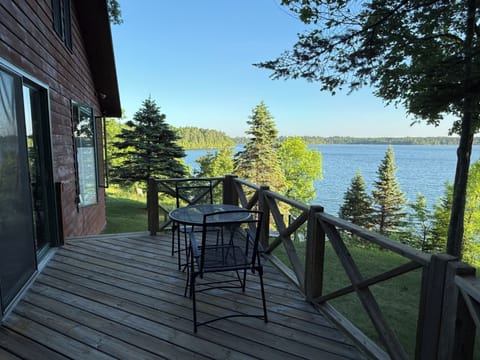 Relax on the deck overlooking the lake.  Great views and a breeze.    