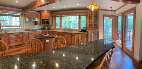 Our big open kitchen with 7 countertop chairs.