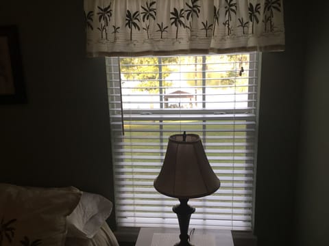 Master Bedroom looking out at the dock and the lake.