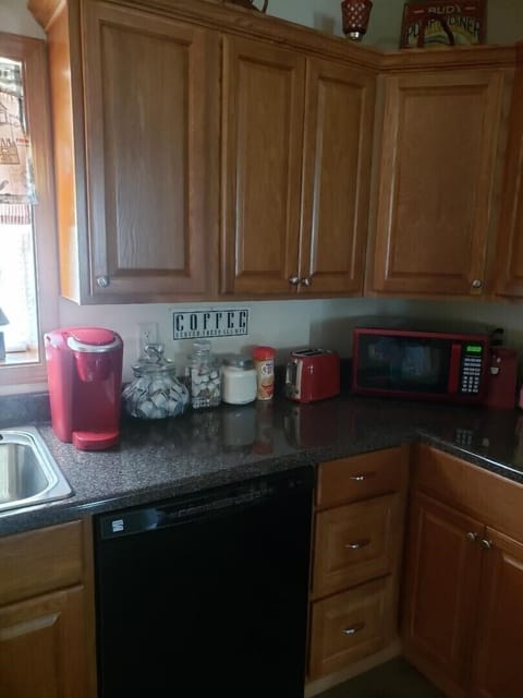 Keurig coffee pot - pods, creamer, and sugar provided. Regular pot available.