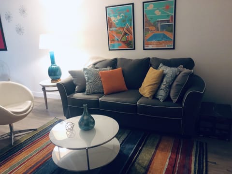 Living room with decor wall art from local artist.