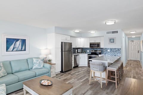 Fully equipped kitchen with brand new appliances and large island with breakfast bar style seating