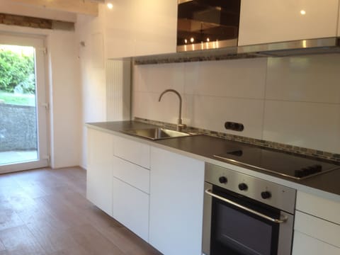 The Kitchen has a stove, oven, microwave and dishwasher