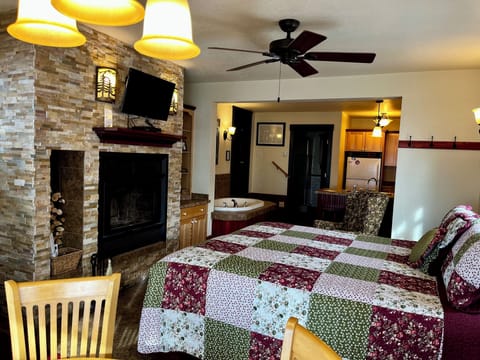 Looking from the Dining Area
Picture yourself snuggled up in the king bed with a fire crackling in front of you while watching a movie with the waves of Lake Superior crashing on the rocks outside the door for Inn Suite #6.