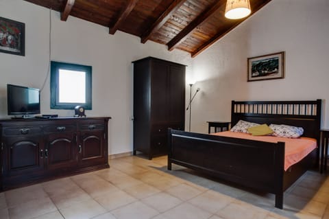 Studio Apartment for 3 people is designed in rustic style. 