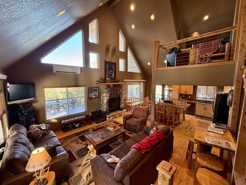 Living room with wood burning fireplace