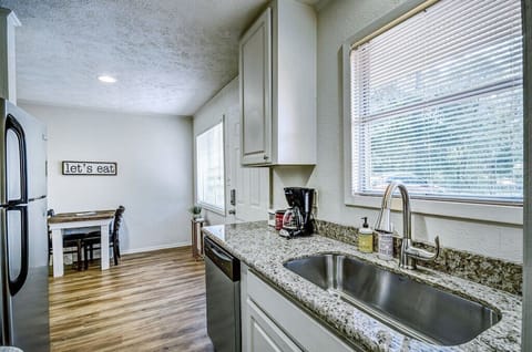 12-cup programmable coffee pot, coffee, toaster, microwave, farmhouse sink. Great for long stays.