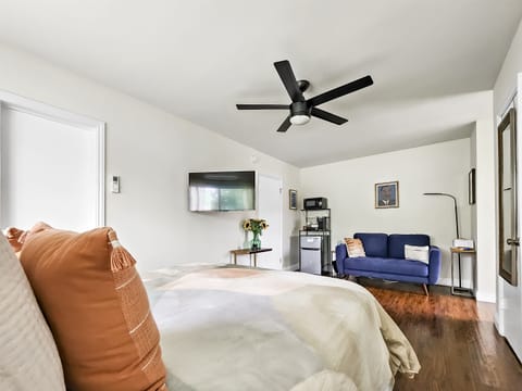 Enjoy TV in bed or on the comfy love seat  with this swivel mount.