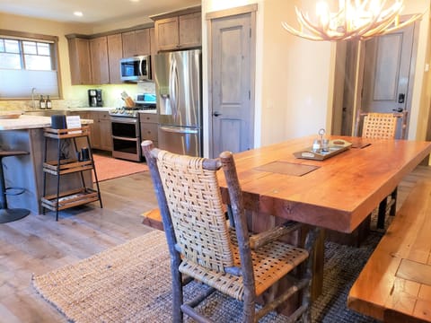 Curated interiors with plush leather, global antique finds and modern touches.